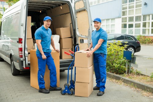 Furniture and office items being transported by a moving van in Bexley