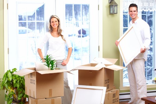 Packed office boxes and desks ready for removal in Bexley