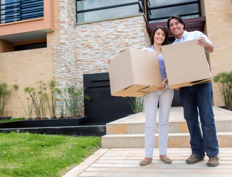 Loading furniture and boxes into a van for a Bexley move
